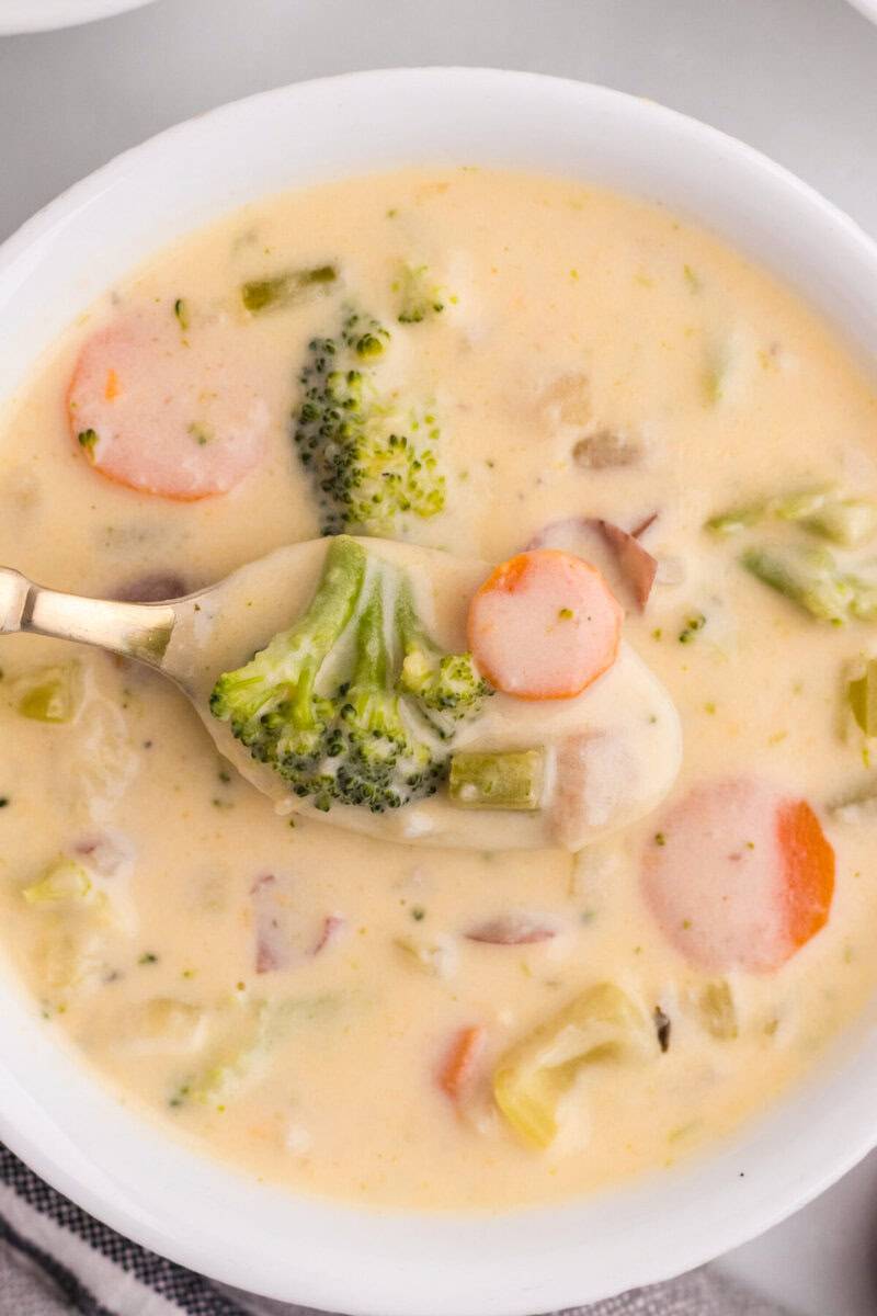 closeup of the soup being eaten on a soup spoon.