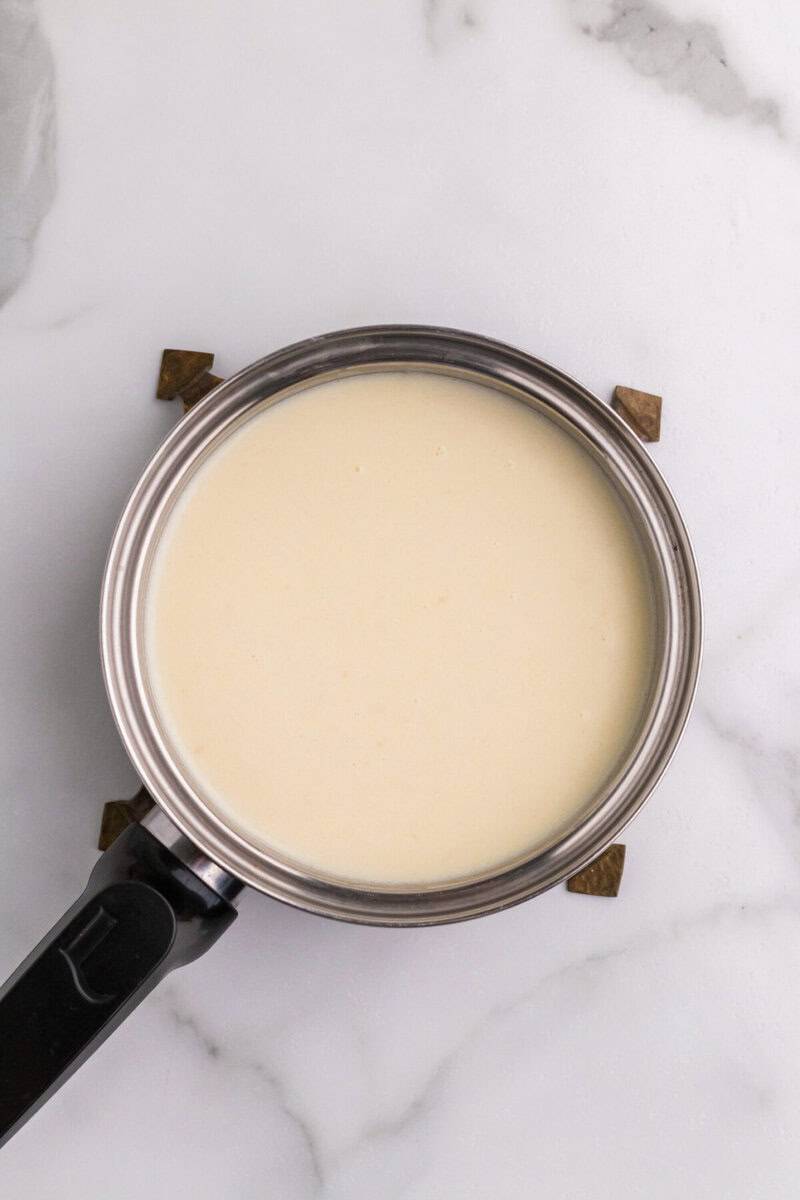 making the cream sauce for the cheese soup.