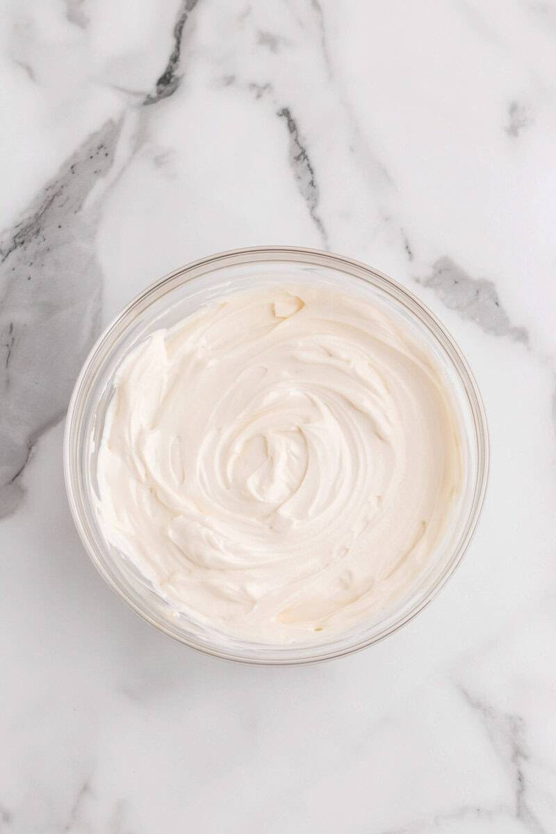 the dip mixed together in a glass bowl.