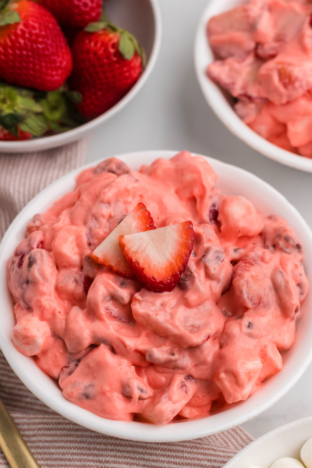 closeup of the Strawberry Fluff served in a white bowl.