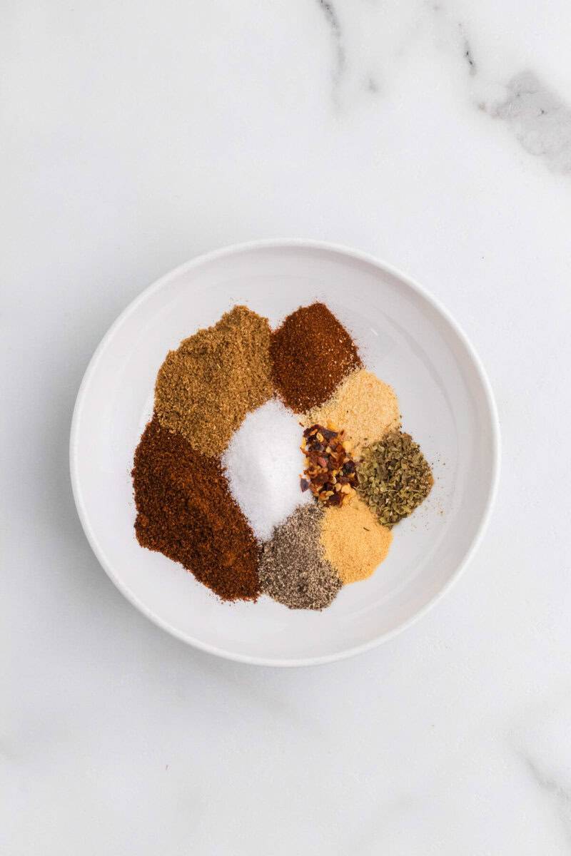 ingredients for the taco seasoning arranged on a plate.