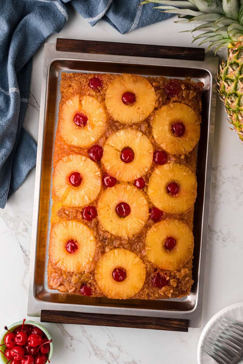 Pineapple Upside Down Cake flipped on to a baking sheet.