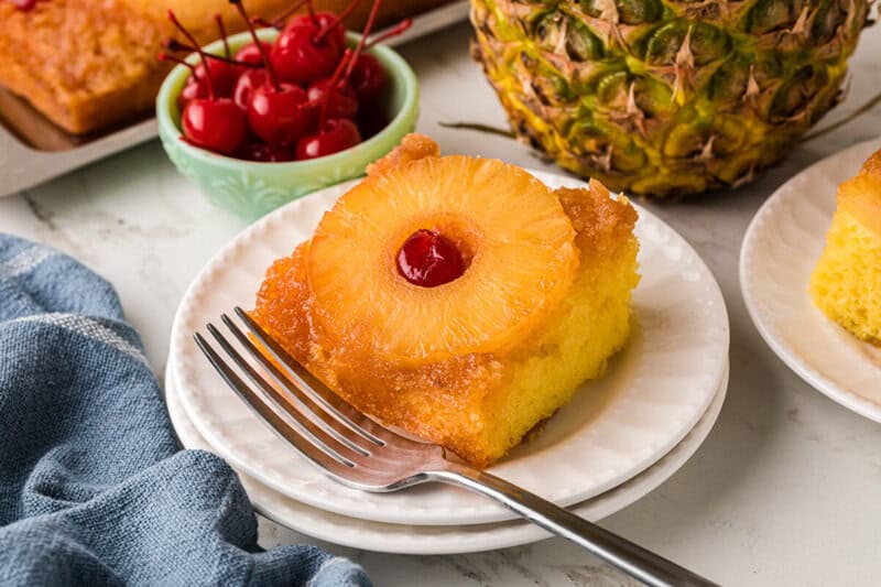 slice of the Pineapple Upside Down Cake on a white plate. 