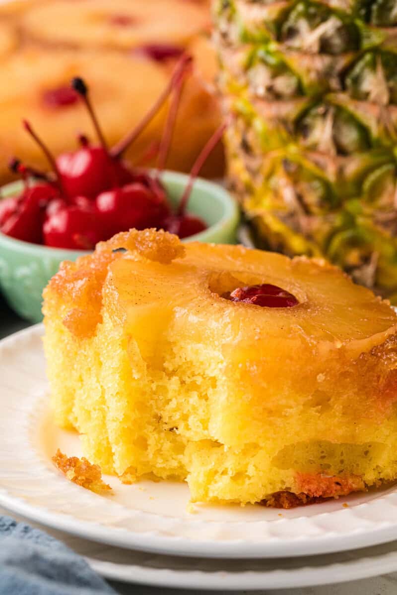 closeup of the Pineapple Upside Down Cake served on a white plate.