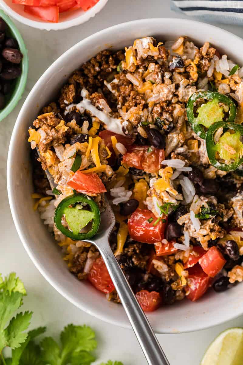 eating the taco bowl.