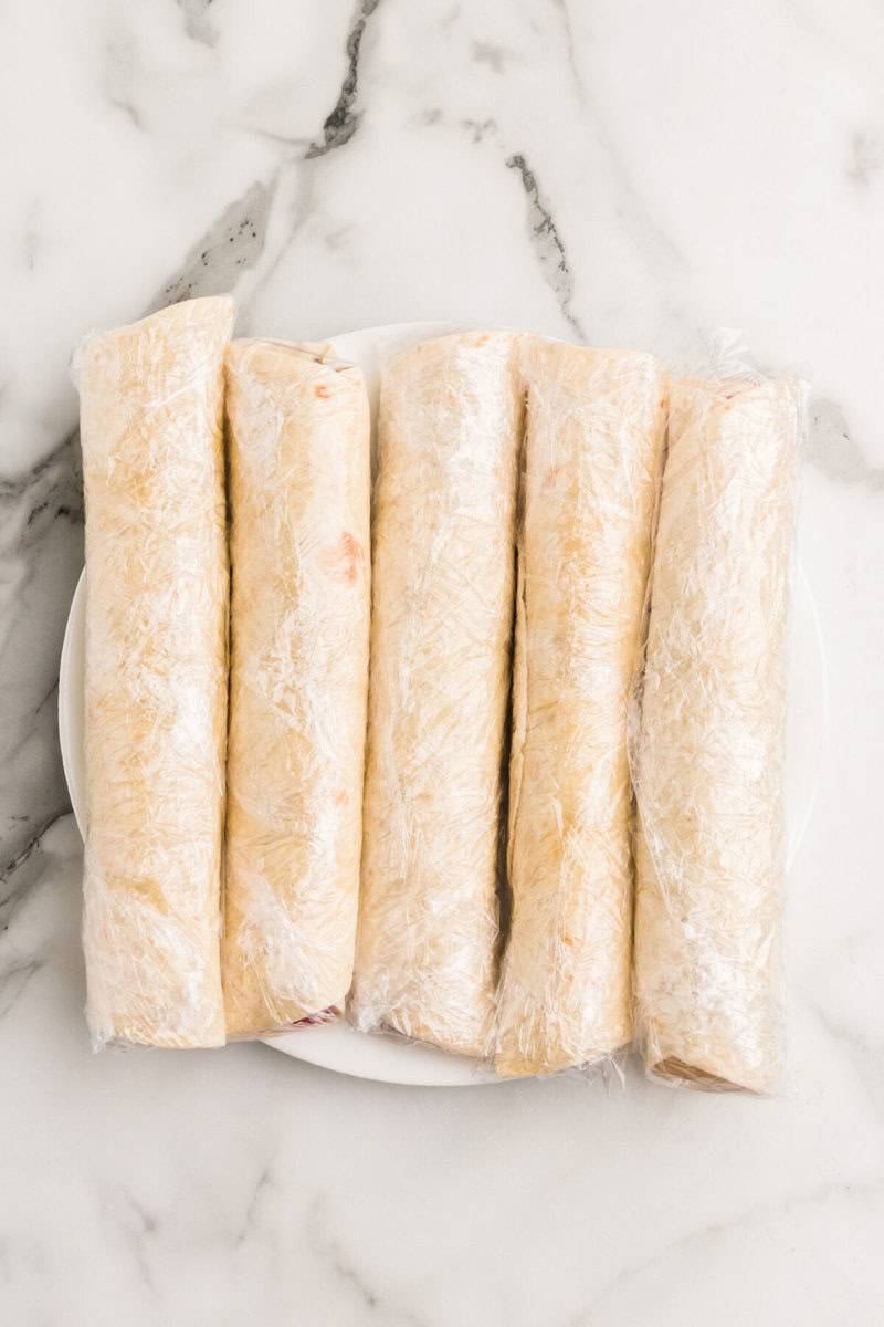 wraps wrapped in plastic wrap before chilling in the refrigerator.