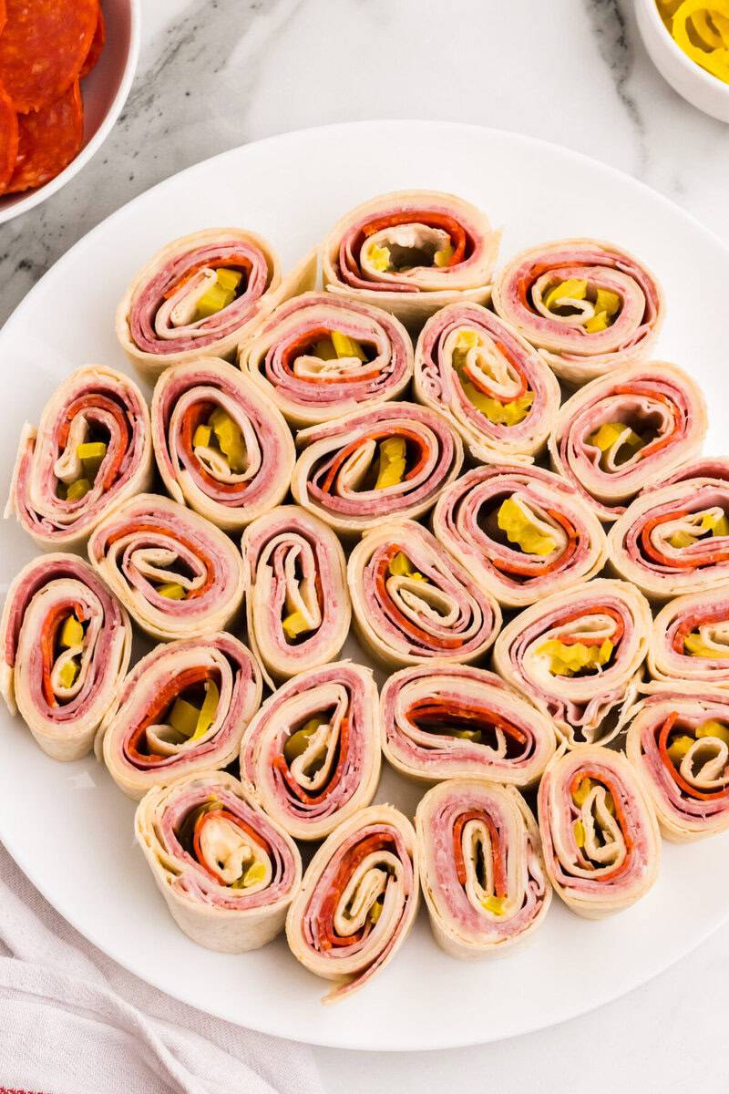 sliced Italian Pinwheels on a white plate.