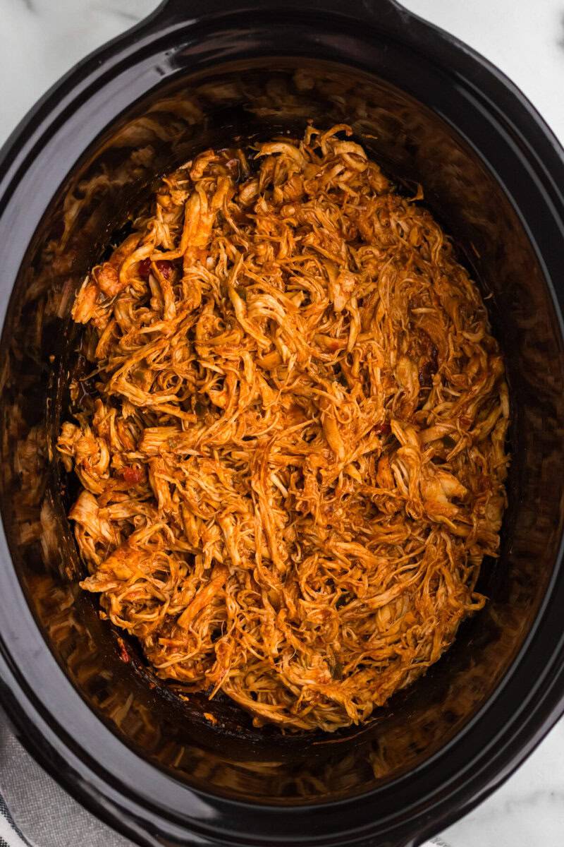 chicken shredded in the slow cooker.