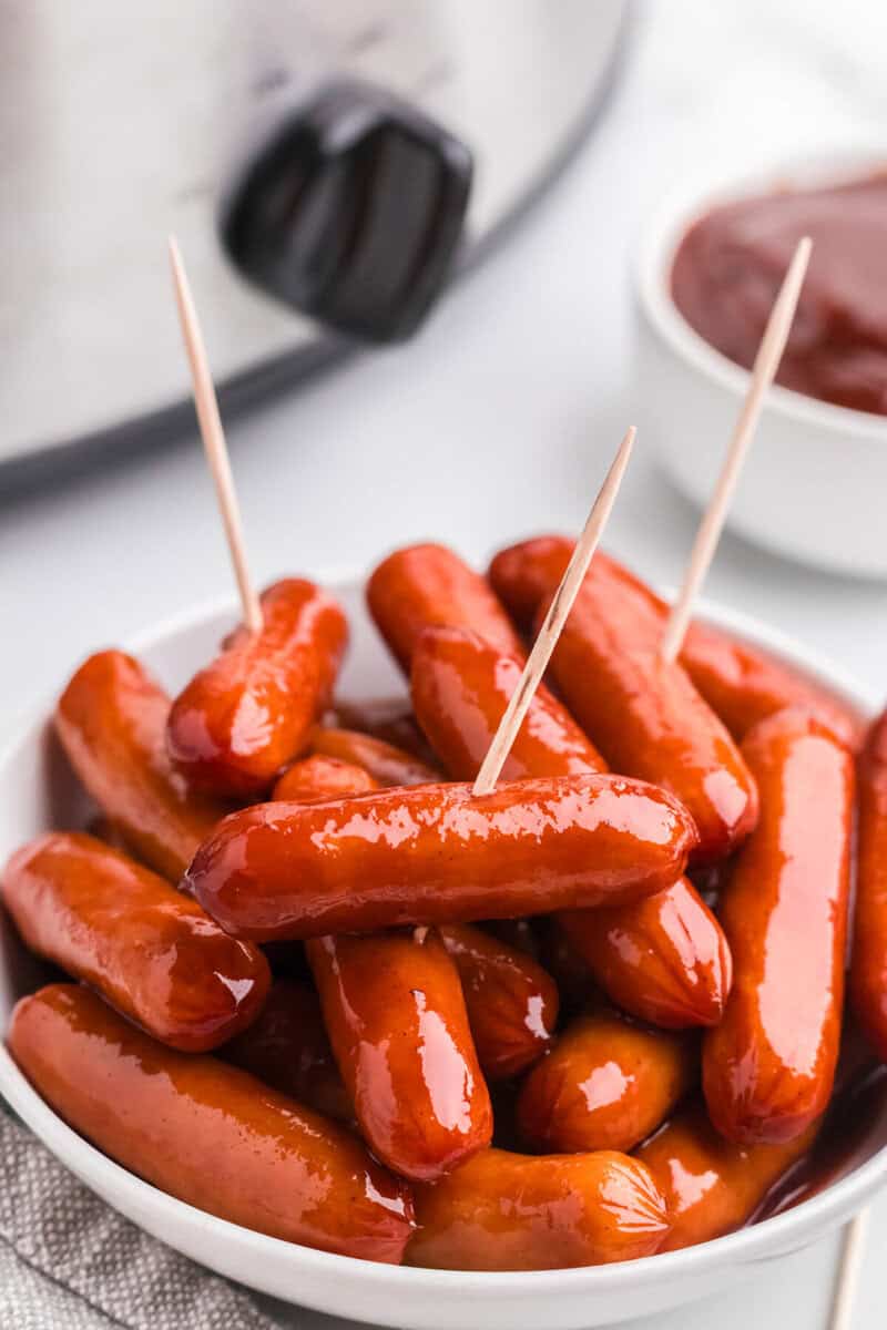 Little Smokies served in a white serving bowl.