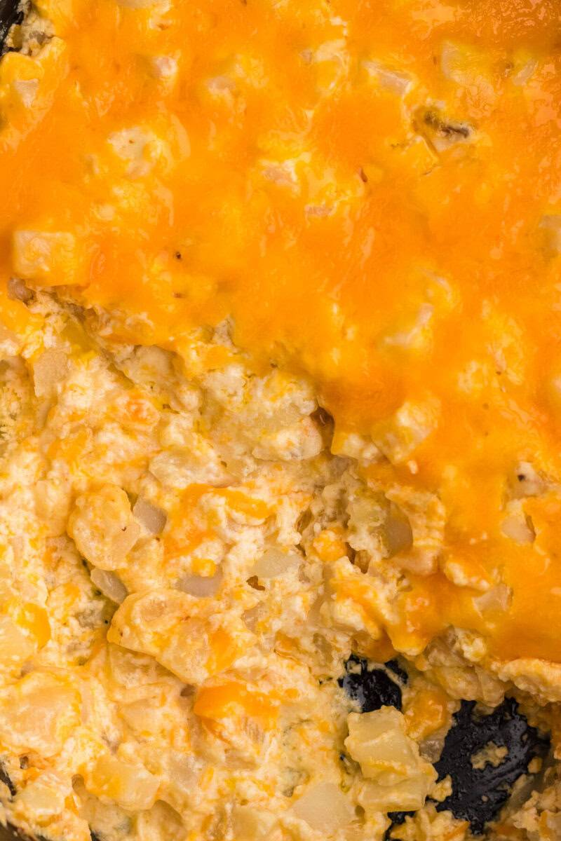 closeup of the Cheesy Potato Casserole in the slow cooker.