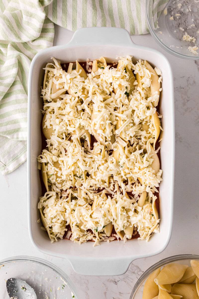 Mozzarella Cheese sprinkled on top of the Stuffed Shells before baking.
