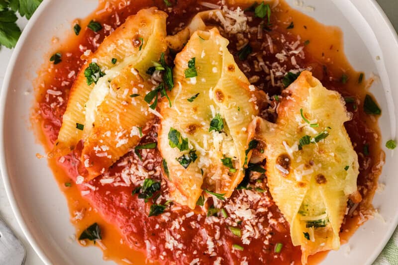 top-down view of the Stuffed Shells served on a white plate.