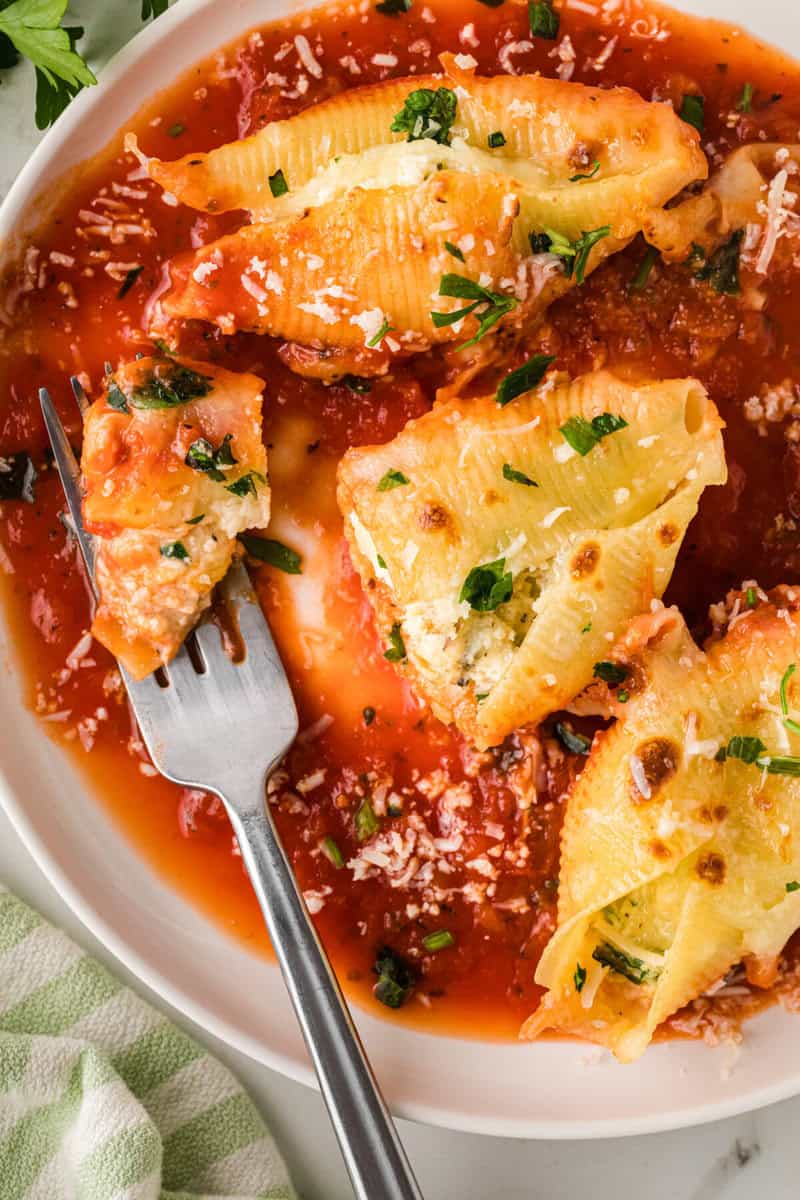 eating the Stuffed Shells with a fork.