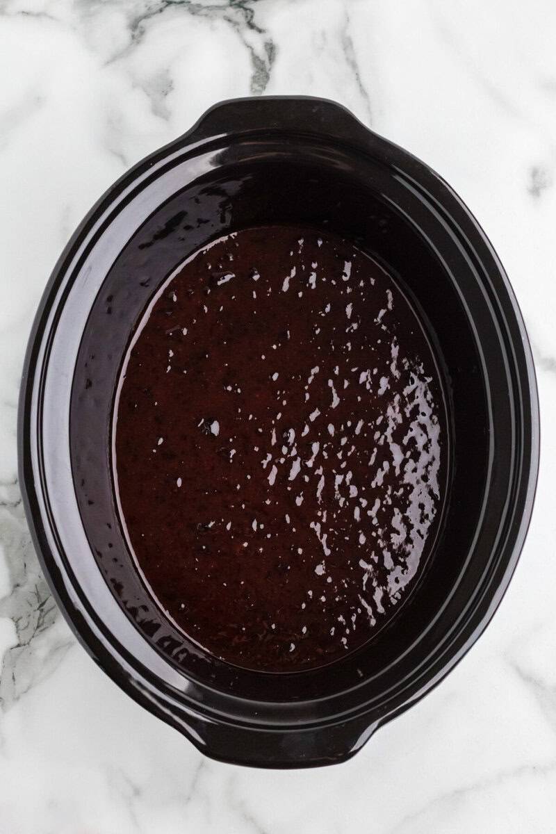 grape jelly and BBQ sauce in the bottom of the slow cooker.