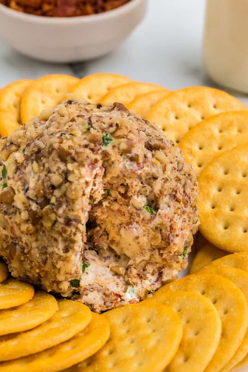 closeup of the Bacon Ranch Cheese Ball with Ritz crackers.