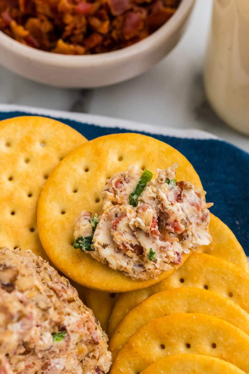 some of the cheese ball served on a Ritz cracker.