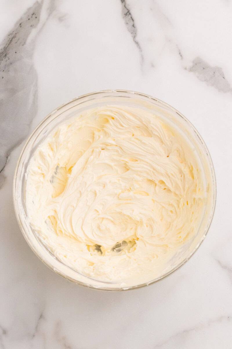 cream cheese whipped in a large bowl.