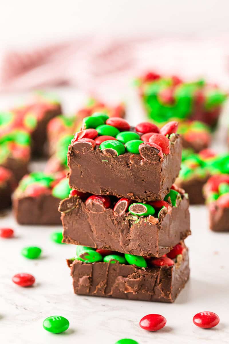 three Christmas Fudge Pieces Stacked on top of each other.