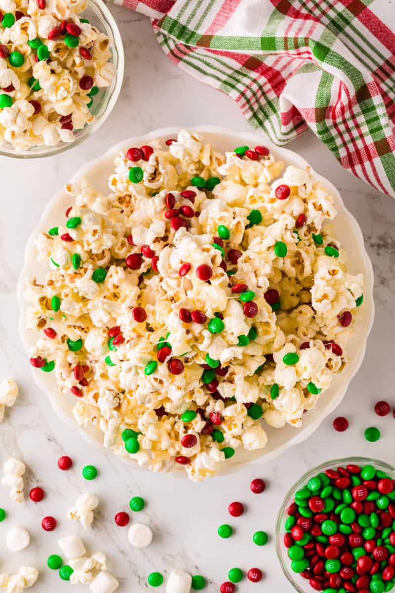 top-down view of Christmas Popcorn served in a white bowl.