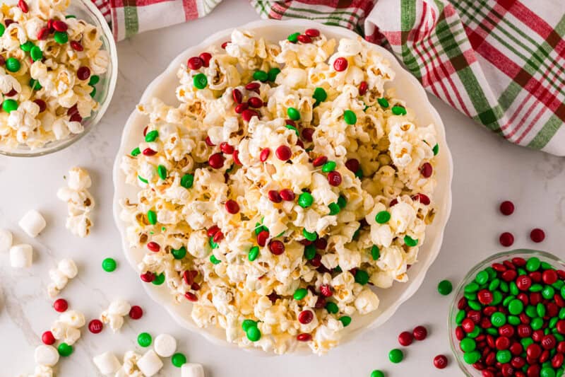 top-down view of the Christmas Popcorn served in a white bowl.