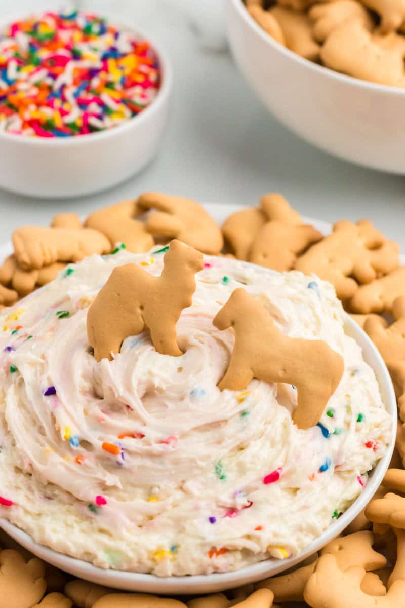 closeup of the Funfetti Dip topped with two animal crackers.