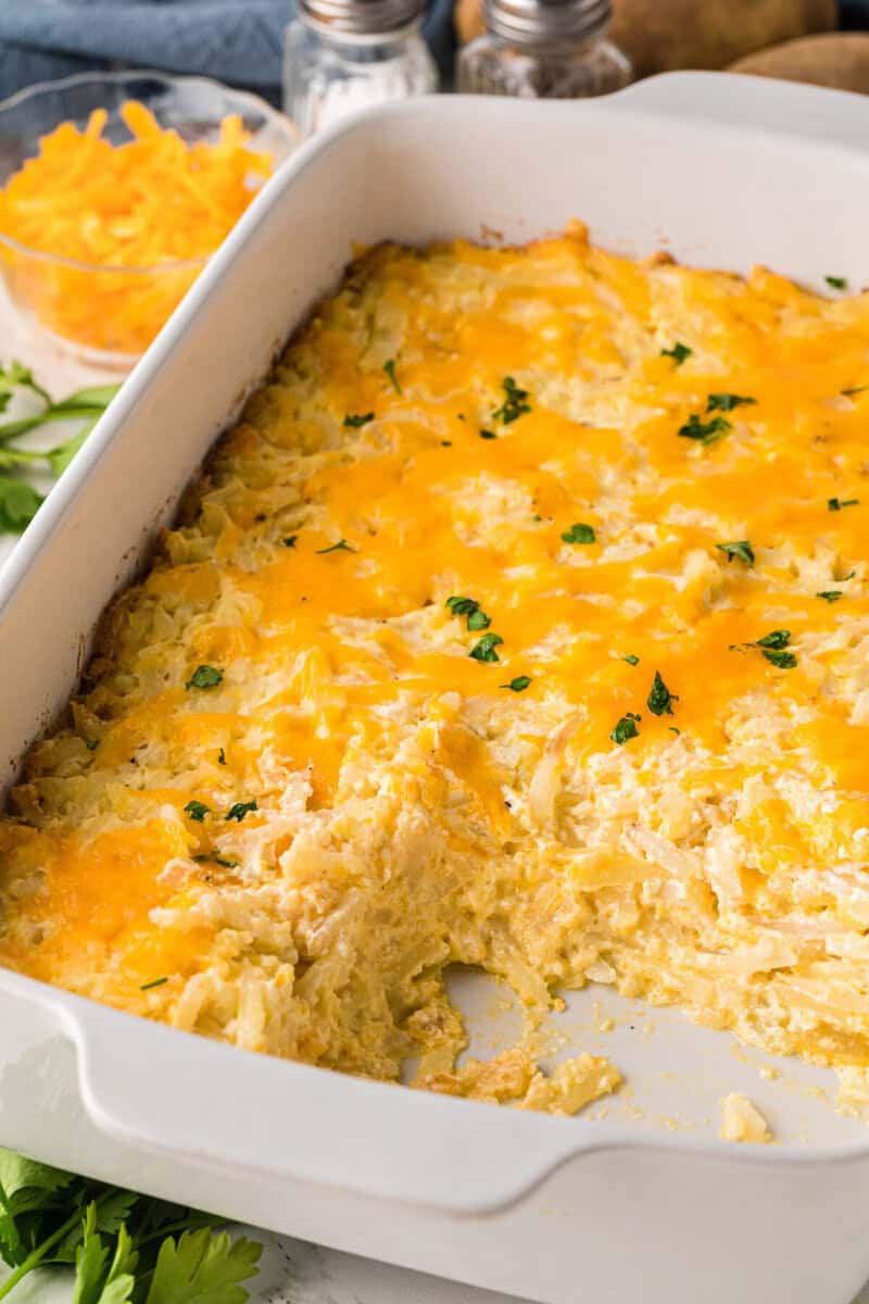 a serving of the Hashbrown Casserole out of the casserole dish.