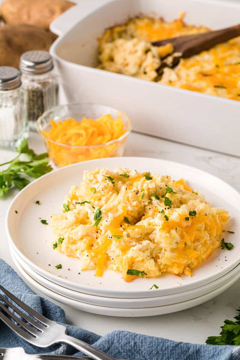 serving of the Hashbrown casserole served on a white plate.