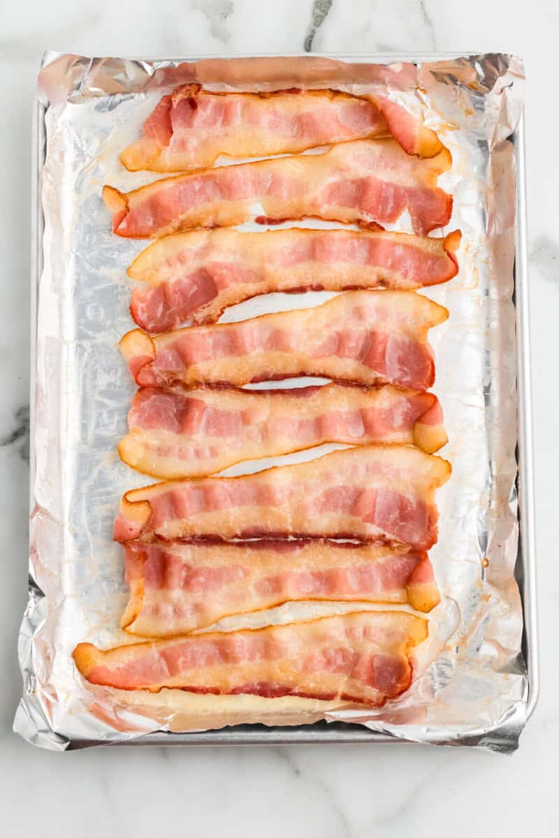 cooked bacon on the baking sheet.