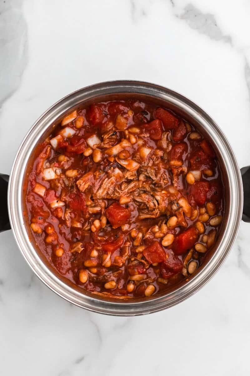 top-down view of the Pulled Pork Chili in a large pot.