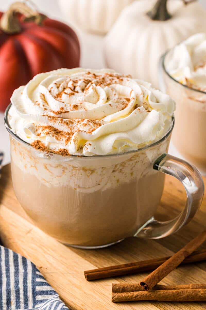 closeup of the pumpkin spice latter topped with whipped cream.