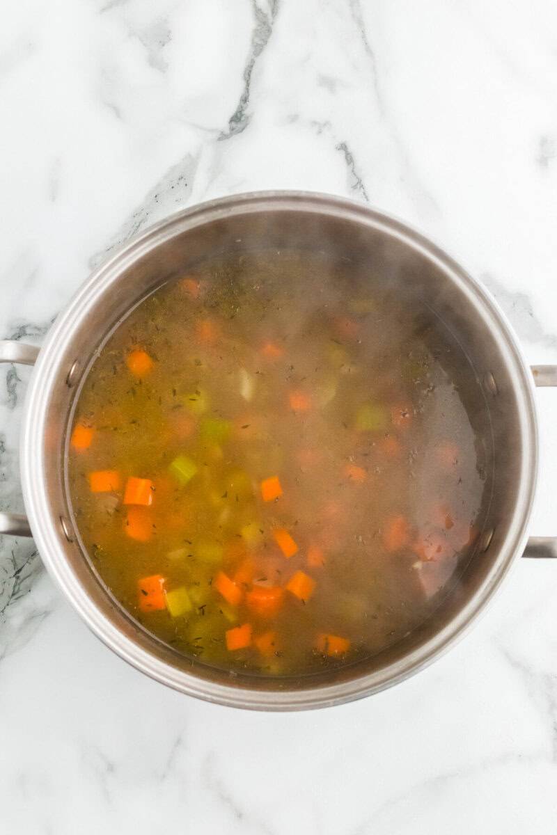 veggies and brother cooking in the pot.