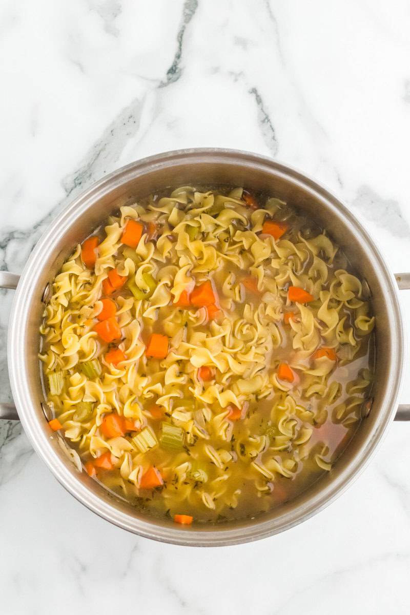 egg noodles added to the pot.