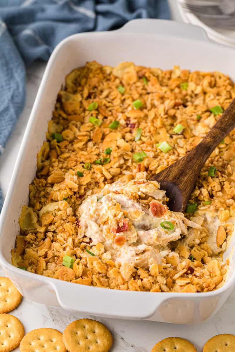 Million Dollar Chicken Casserole baked in a white casserole dish.