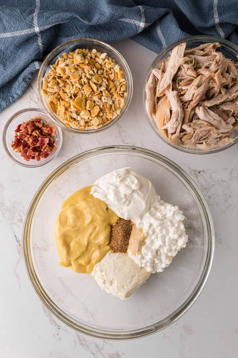 ingredients for the casserole in a clear mixing bowl.