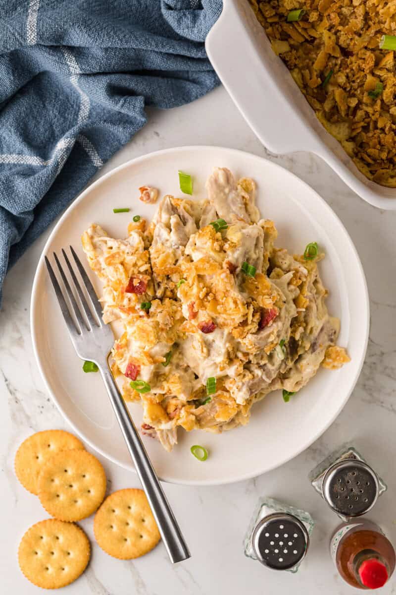 top-down view of the Million Dollar Chicken Casserole served on a white plate.