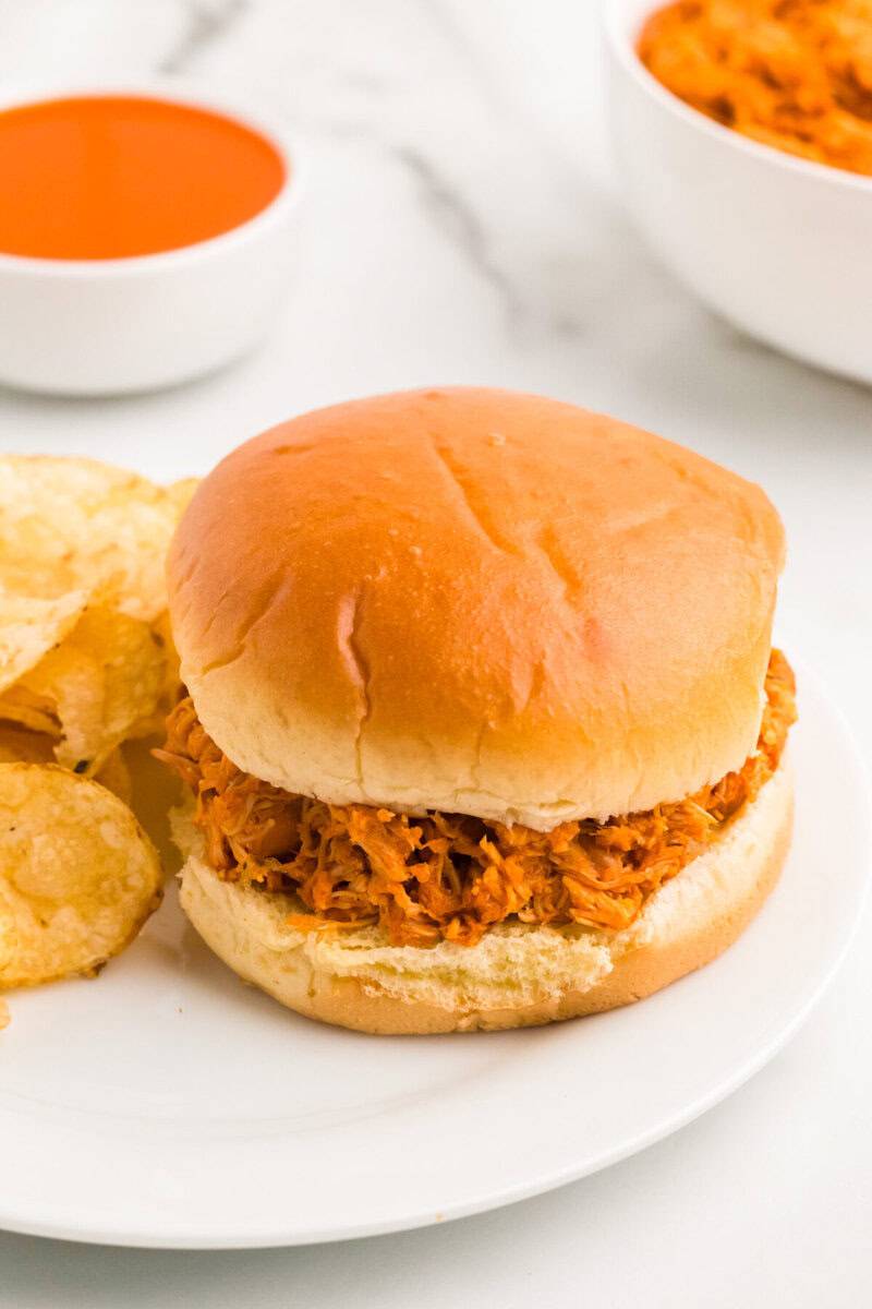closeup of the Buffalo Chicken Sandwich served on a plate.