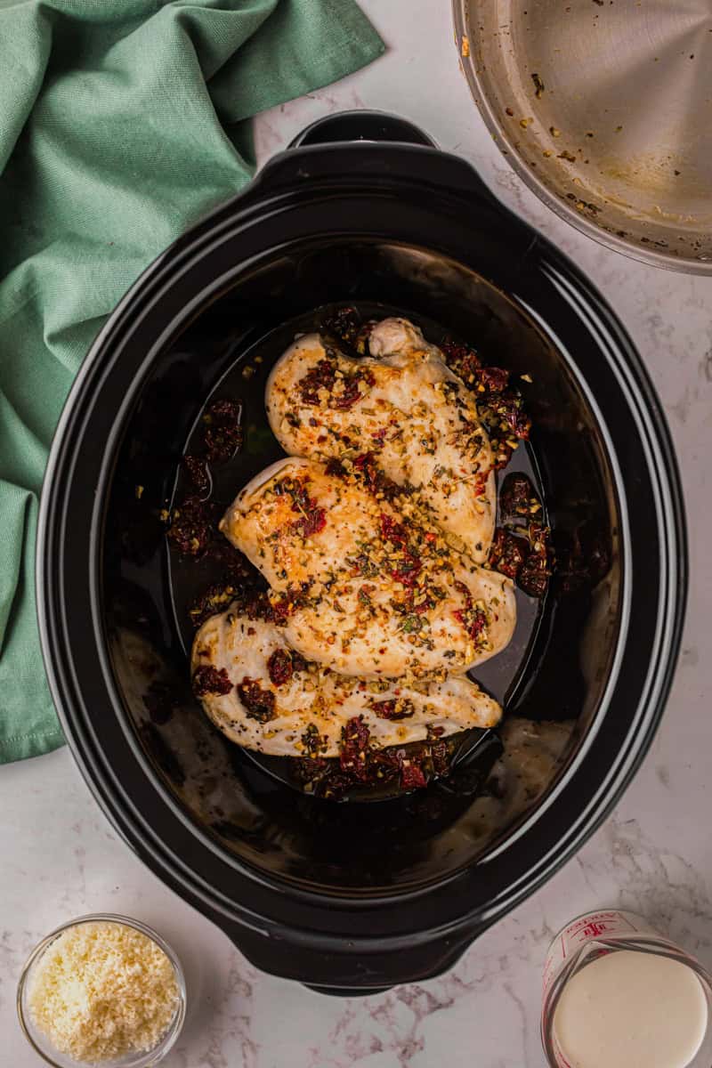 top-down view of the Marry Me Chicken in the slow cooker.