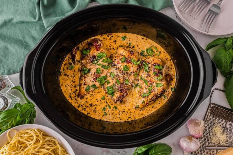 top-down view of the Marry Me chicken in the slow cooker.