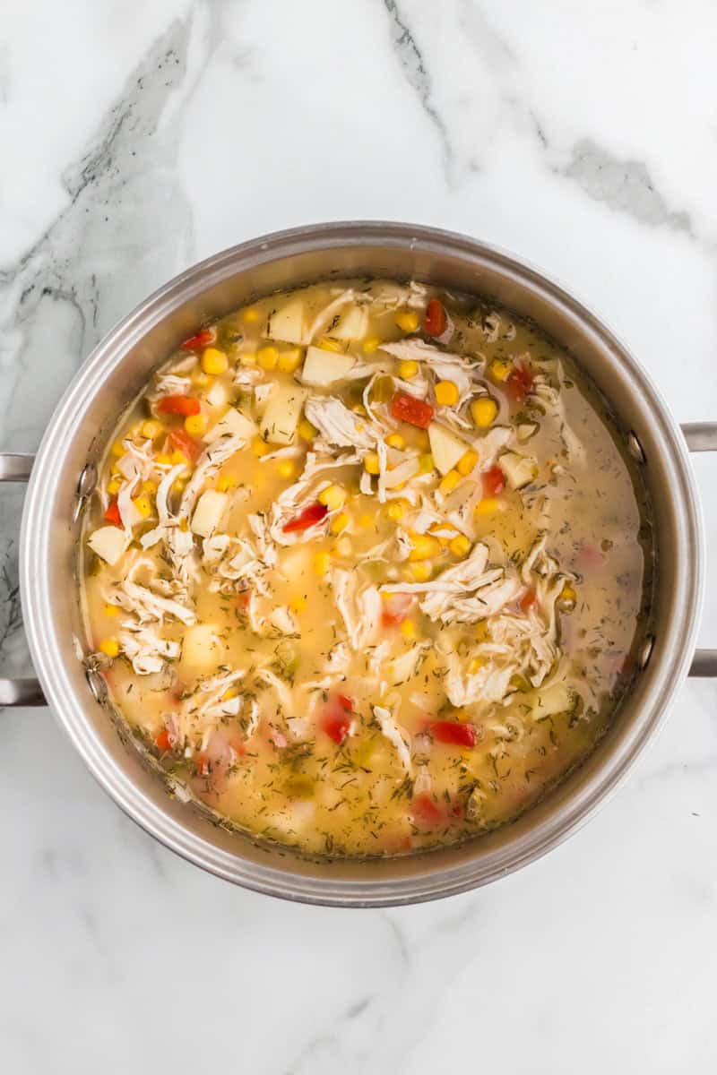 top-down view of the chowder cooking in the pot.