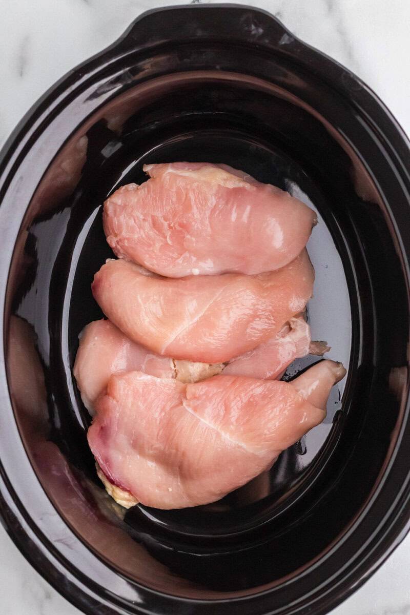 chicken breasts in the bottom of the slow cooker.
