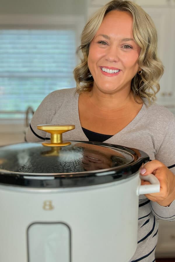 Jennie Duncan food blogger holding slow cooker