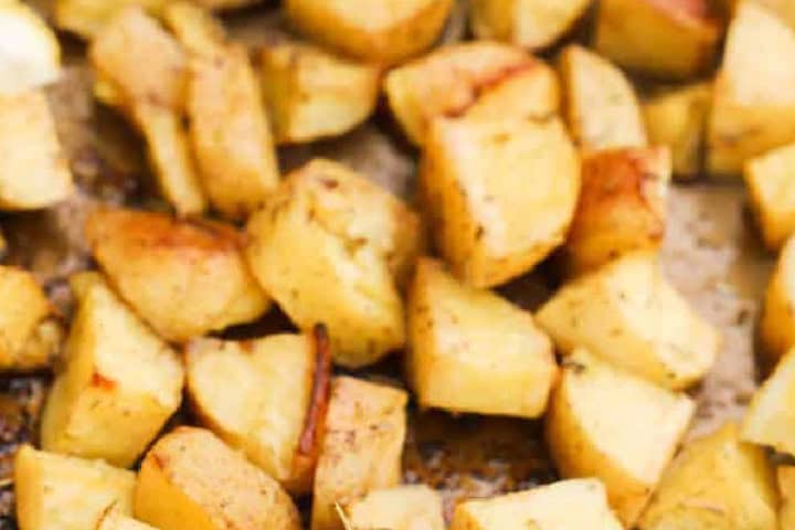 Closeup of the Lemon Herb Roasted Potatoes on the baking sheet.