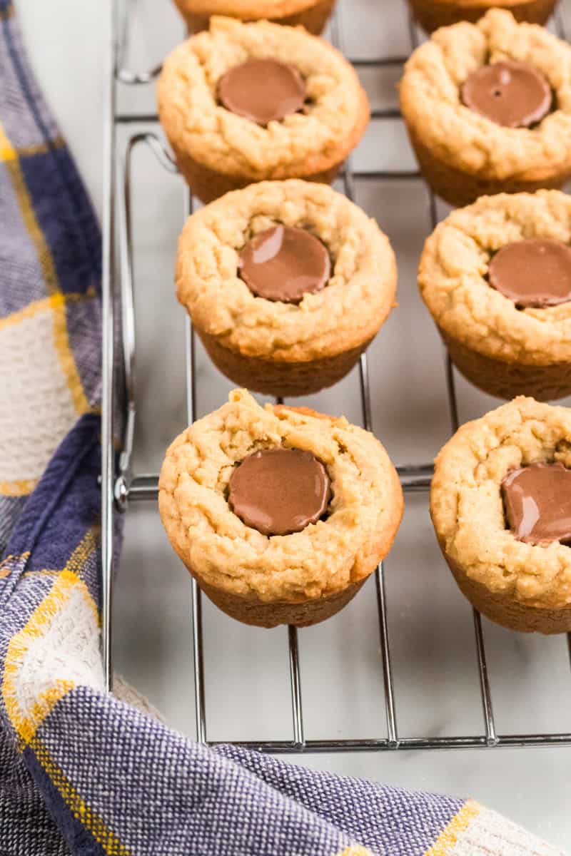 closeup of the peanut butter cup cookies on the cooling rack.