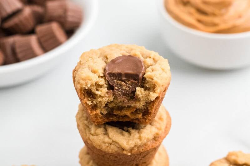 peanut butter cup cookie with a bite taken out of it.