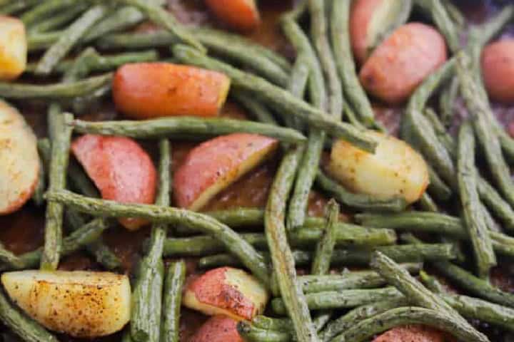 Roasted Green Beans and Potatoes closeup on baking sheet.
