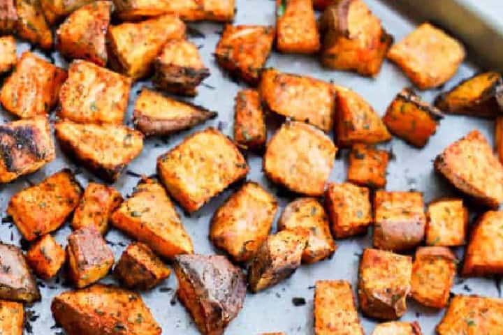 Roasted Sweet Potatoes closeup on the baking sheet.