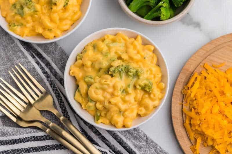 Broccoli Mac and Cheese served on a white plate.