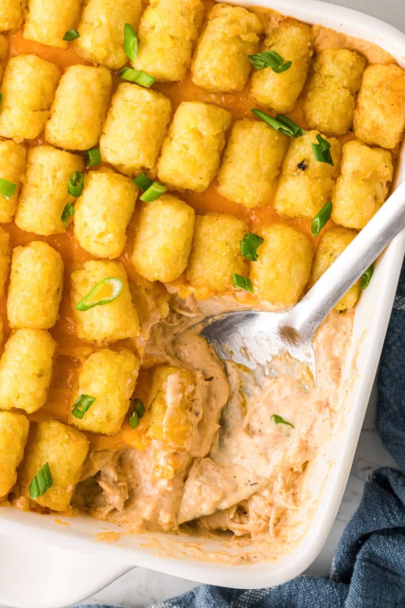 top-down view of the Buffalo Chicken tater Tot Casserole in the baking dish.