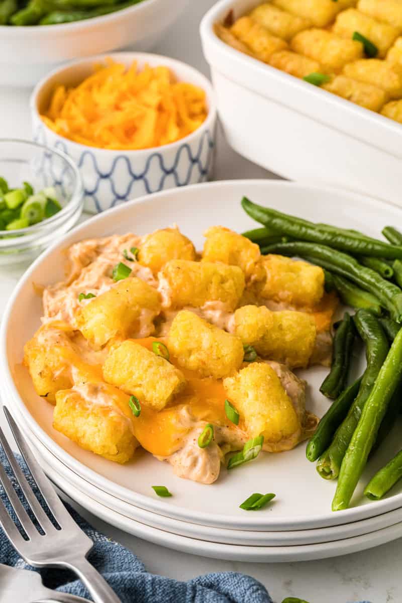 serving the casserole on white plates.