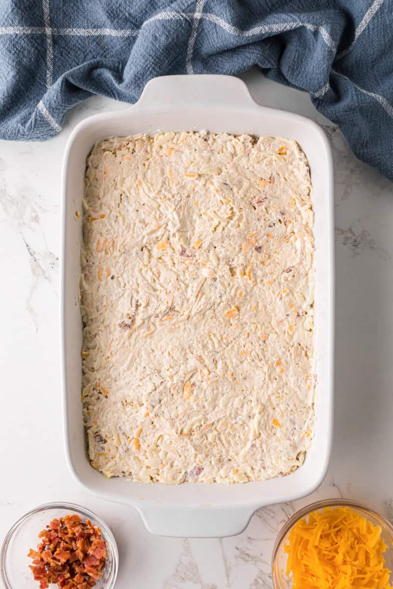 the mixed chicken casserole in the baking dish.